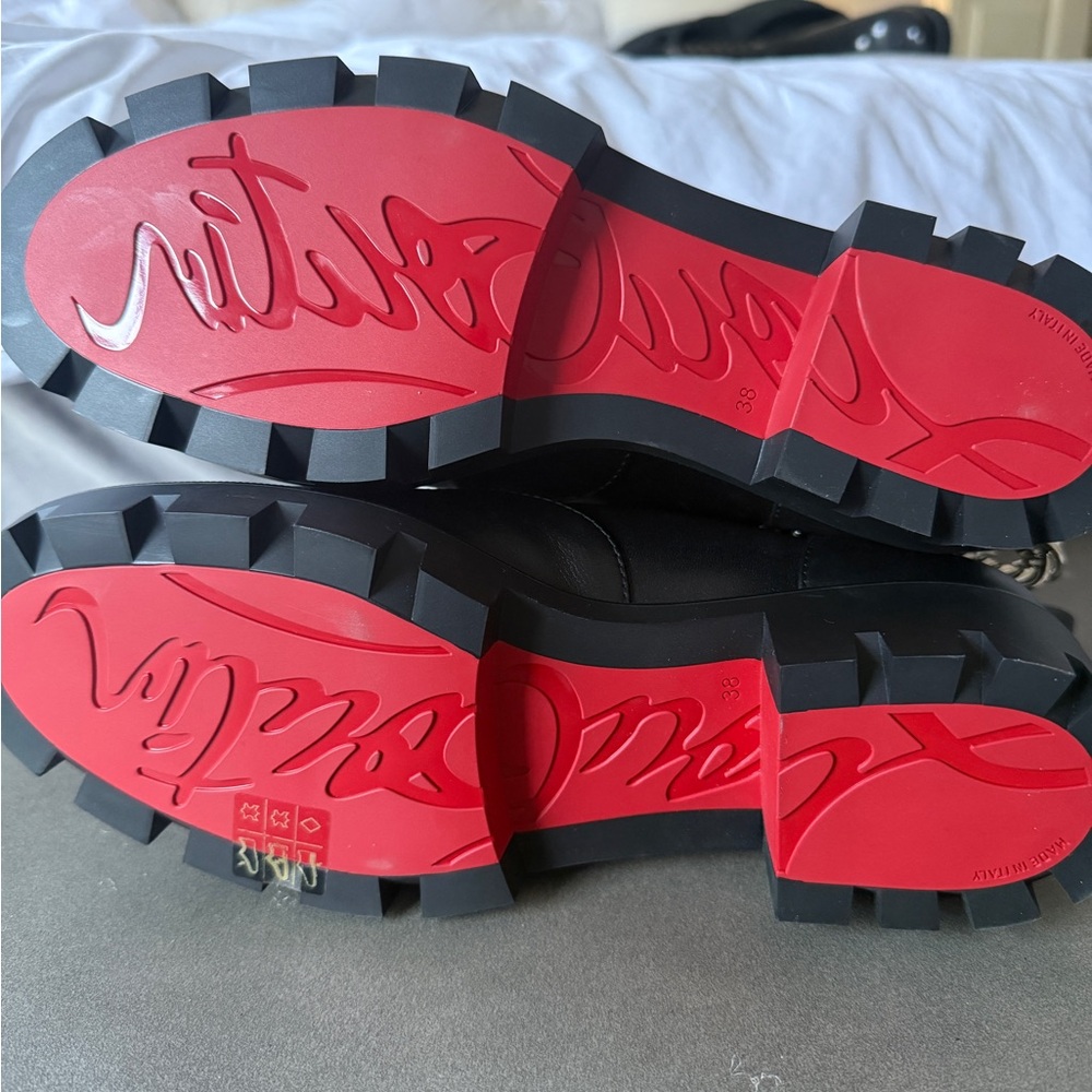 Christian Louboutin Black Ankle Boots with Signature Red Soles